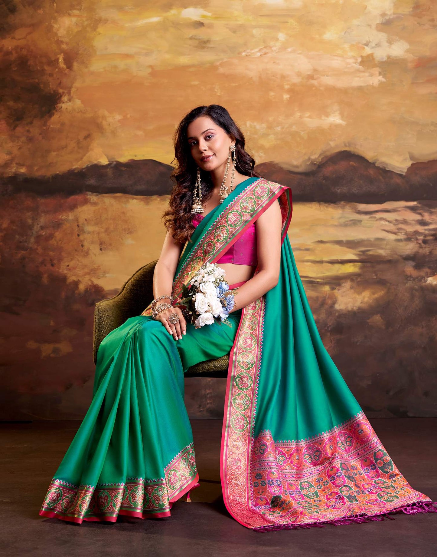 Teal Green Silk Woven Patola Saree